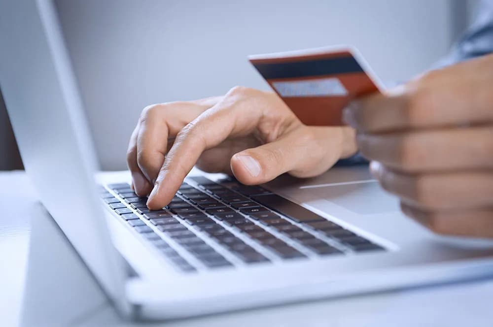 Online shopping with a laptop